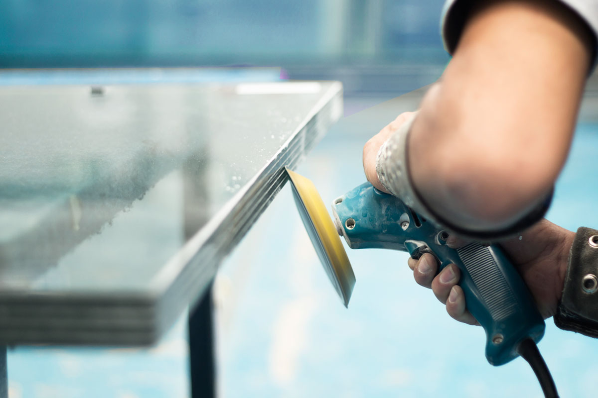 Man polishing glass